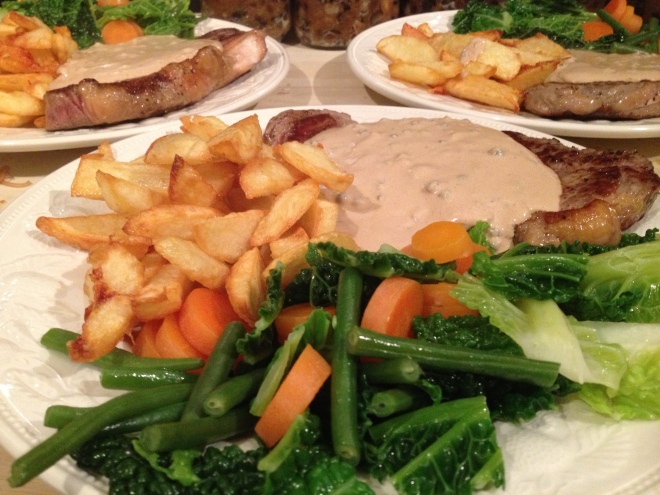 Steak with peppercorn sauce, steamed veg and home fried chunky chips.